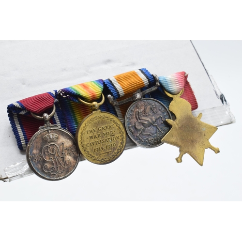 310H - A set of 4 miniature World War One medals.