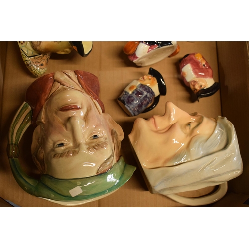 19 - A collection of Toby and Character jugs to include Beswick Scrooge and Henry VIII, Sylvac Henry VIII... 