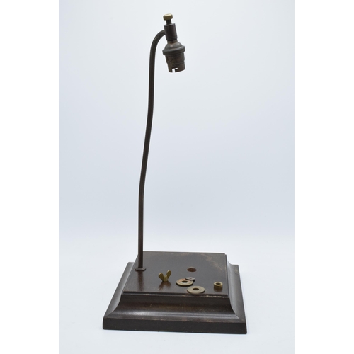 140 - A wooden and metal lamp base with some fittings for use with a Royal Doulton figure.