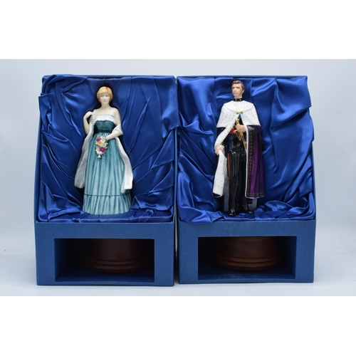 125 - Boxed Royal Doulton figures to include HRH The Prince of Wales HN2883 and Lady Diana Spencer HN2885,... 