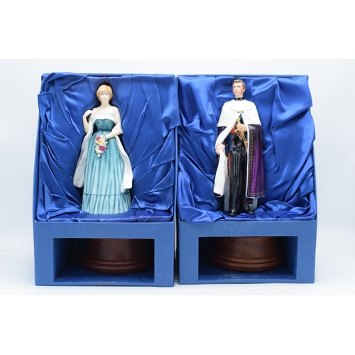 125 - Boxed Royal Doulton figures to include HRH The Prince of Wales HN2883 and Lady Diana Spencer HN2885,... 