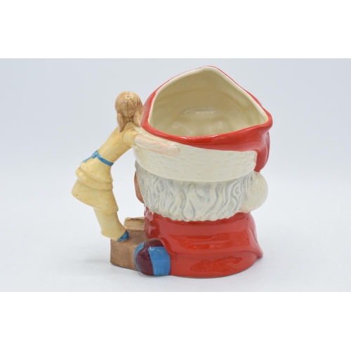 143 - Large Royal Doulton character jug Santa Claus D6668 with toy doll handle.