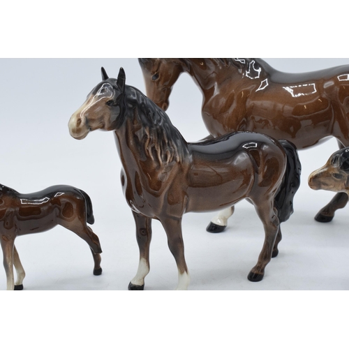 152 - Beswick horses to include brown stocky jogging mare 855, Shetland pony, head up pony and one other (... 