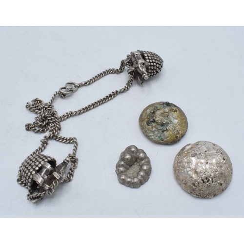 218 - Rough silver ingots x 2 & ethnic jewellery together with a metal example.  The two largest ingots an... 