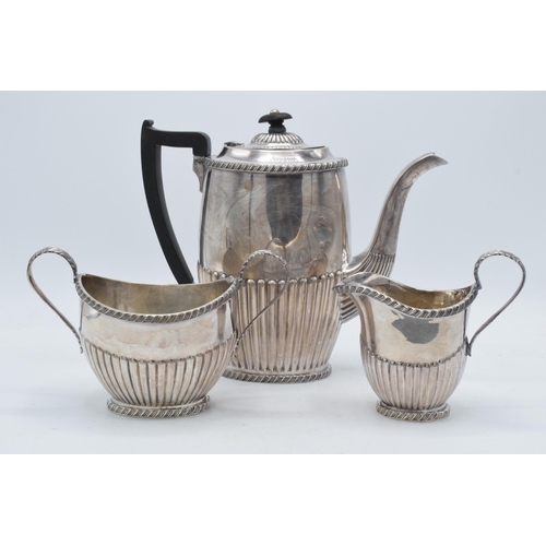 220 - Three-piece silver plated coffee set with ribbed decoration, Made in Sheffield (3).