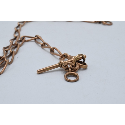 225 - 9ct rose gold Albert link chain with T-bar, 27.5 grams. Each mark individually marked. 41cm long.