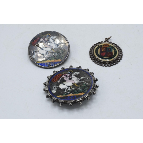 241D - 3 Victorian silver coins with enamelled decoration in the form of brooches and pendants (3).