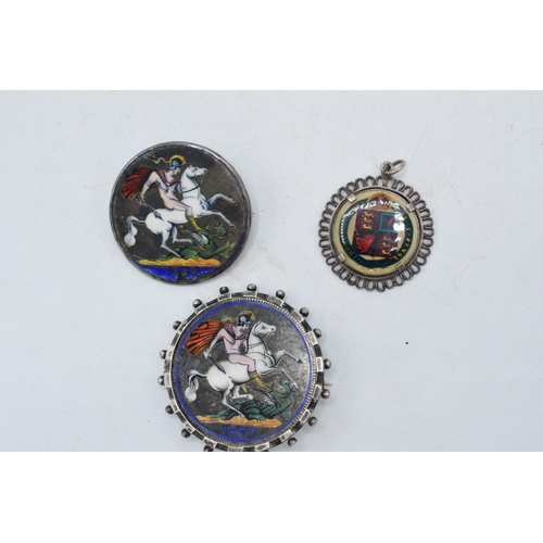 241D - 3 Victorian silver coins with enamelled decoration in the form of brooches and pendants (3).