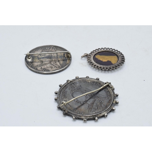 241D - 3 Victorian silver coins with enamelled decoration in the form of brooches and pendants (3).