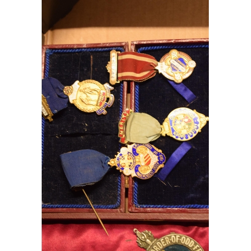 243 - An interesting collection of Masonic related items to include medals, pendants and a Walton Lodge ba... 