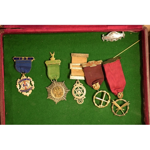 243 - An interesting collection of Masonic related items to include medals, pendants and a Walton Lodge ba... 