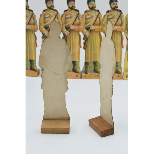 244 - A collection of unusual early 20th century free standing cardboard soldiers of varying forms, ranks ... 