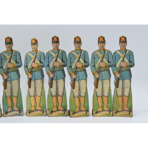 246 - A collection of unusual early 20th century free standing cardboard soldiers of varying forms, ranks ... 