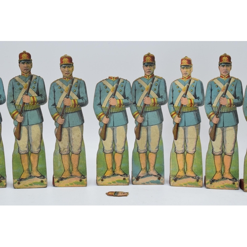 246 - A collection of unusual early 20th century free standing cardboard soldiers of varying forms, ranks ... 