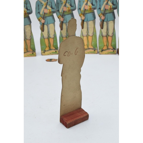 246 - A collection of unusual early 20th century free standing cardboard soldiers of varying forms, ranks ... 