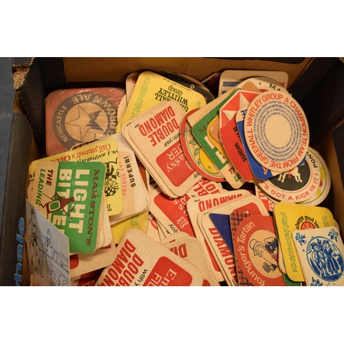 25 - A large collection of vintage advertising beer mats to include Double Diamond, Cherry B, Tuborg, Pla... 