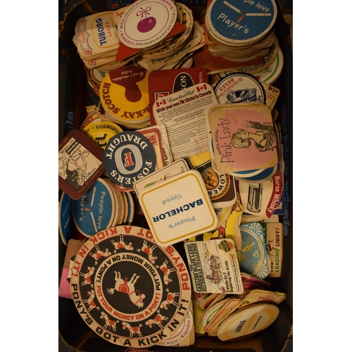 25 - A large collection of vintage advertising beer mats to include Double Diamond, Cherry B, Tuborg, Pla... 