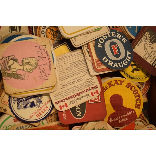 25 - A large collection of vintage advertising beer mats to include Double Diamond, Cherry B, Tuborg, Pla... 