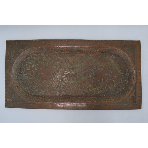 254 - An early 20th century heavy rectangular copper platter / tray with engraved decoration, thought to b... 