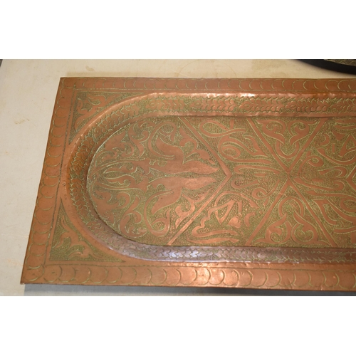 254 - An early 20th century heavy rectangular copper platter / tray with engraved decoration, thought to b... 