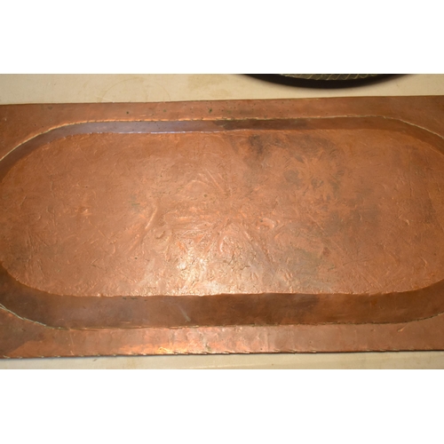 254 - An early 20th century heavy rectangular copper platter / tray with engraved decoration, thought to b... 