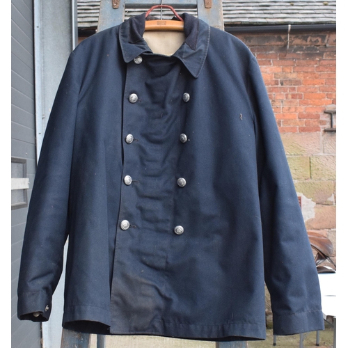 257 - A vintage Staffordshire Fire Brigade jacket with detachable lining, size 13.