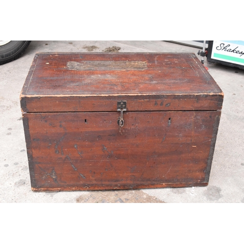 269 - A late 19th / early 20th century stained pine blanket box with metal fixings, 77 x 50 x 46cm tall.