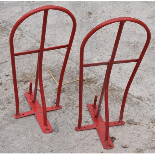 270A - A pair of vintage 20th century saddle / bridle hangers by Stubbs of England in a powder dip coated f... 