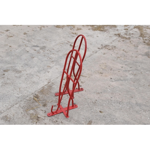 270A - A pair of vintage 20th century saddle / bridle hangers by Stubbs of England in a powder dip coated f... 