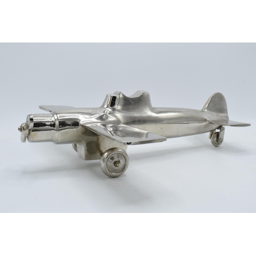 275 - Vintage 20th century nickel-plated cast metal model of a plane with rotating wheels and propeller, 4... 