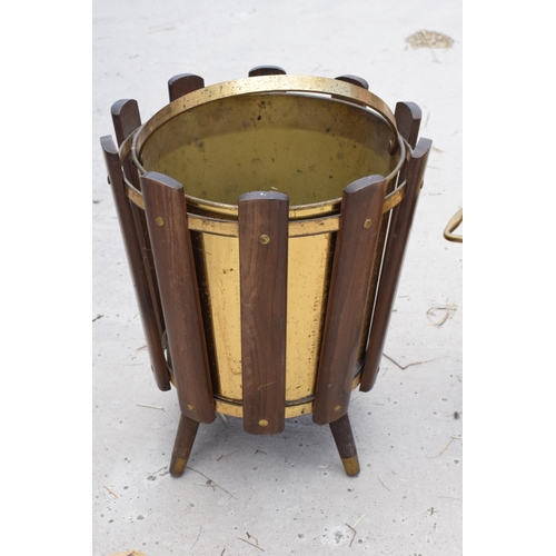 282 - A late 19th century embossed copper coal bucket together with a 20th century wooden and brass exampl... 