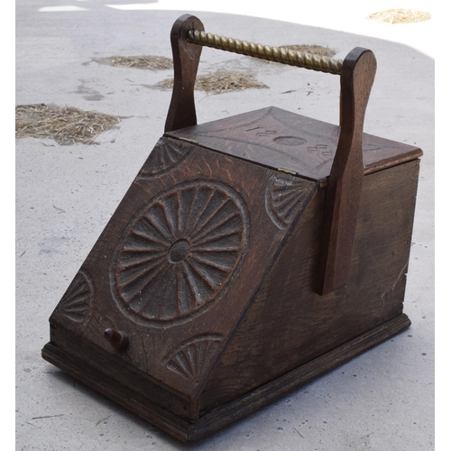 283 - Victorian wooden coal scuttle with brass handle and brass shovel with carved decoration '1888' to th... 