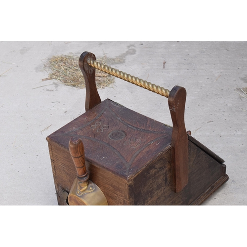 283 - Victorian wooden coal scuttle with brass handle and brass shovel with carved decoration '1888' to th... 