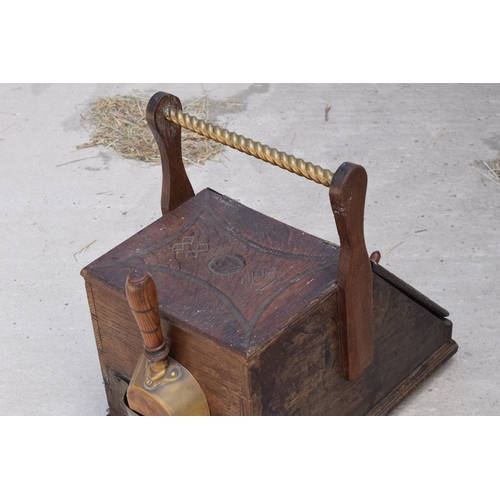 283 - Victorian wooden coal scuttle with brass handle and brass shovel with carved decoration '1888' to th... 