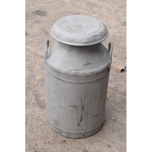 284B - Vintage milk churn with lid, 61cm tall, split to one side.