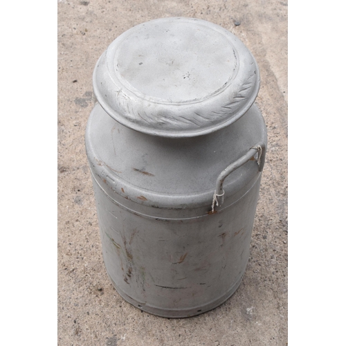 284B - Vintage milk churn with lid, 61cm tall, split to one side.