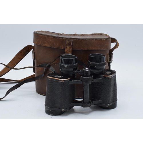 292 - A cased pair of Carl Zeiss Jena Deltrinem 8x30 binoculars.