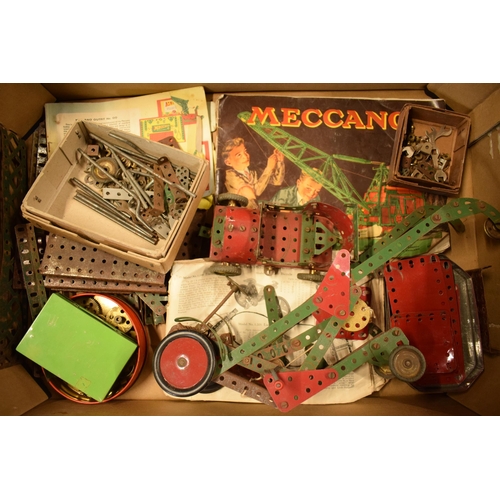 301 - A collection of vintage Meccano to include parts, models, instruction booklets and other items (Qty)... 