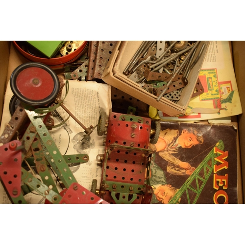 301 - A collection of vintage Meccano to include parts, models, instruction booklets and other items (Qty)... 