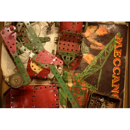 301 - A collection of vintage Meccano to include parts, models, instruction booklets and other items (Qty)... 