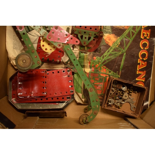 301 - A collection of vintage Meccano to include parts, models, instruction booklets and other items (Qty)... 