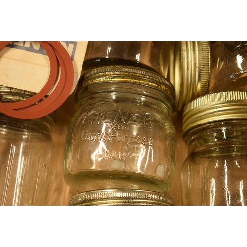 302 - A collection of vintage Kilner glass jars with metal lids together with spare seals / rings (approx ... 