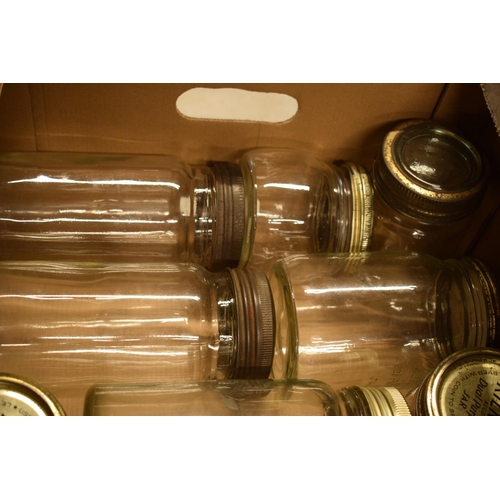 302 - A collection of vintage Kilner glass jars with metal lids together with spare seals / rings (approx ... 