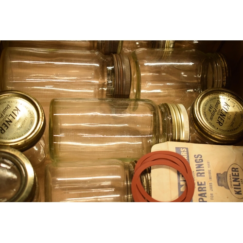 302 - A collection of vintage Kilner glass jars with metal lids together with spare seals / rings (approx ... 