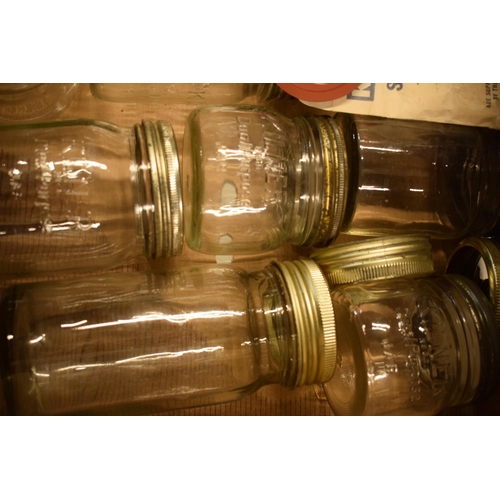 302 - A collection of vintage Kilner glass jars with metal lids together with spare seals / rings (approx ... 