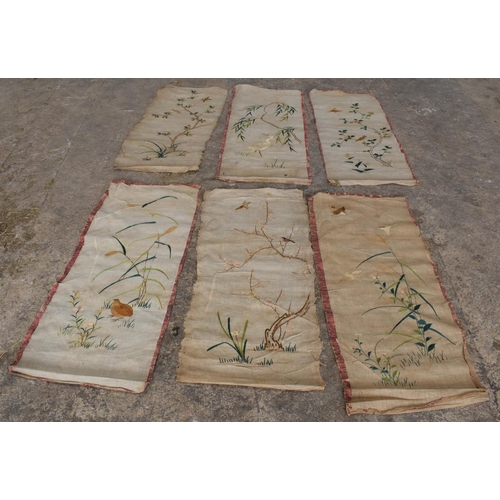 307 - A collection of 6 Chinese silk wall hangings, each approximately 120 x 52cm.