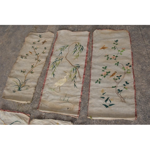 307 - A collection of 6 Chinese silk wall hangings, each approximately 120 x 52cm.