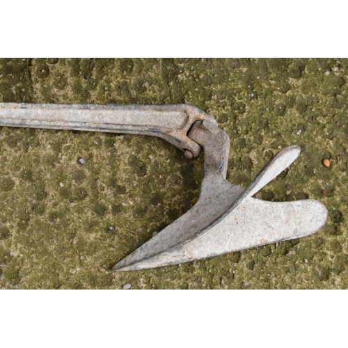 328 - A vintage cast metal pair of ship's anchors, 51cm long (2).