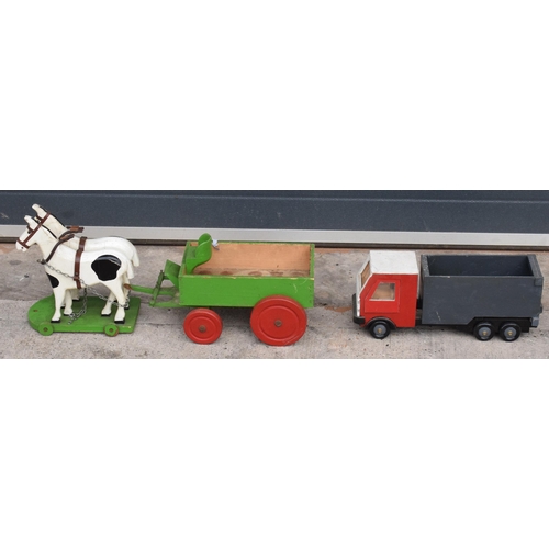 333 - A pair of vintage 20th century scratch built wooden toys in the form of a lorry and horses and cart ... 