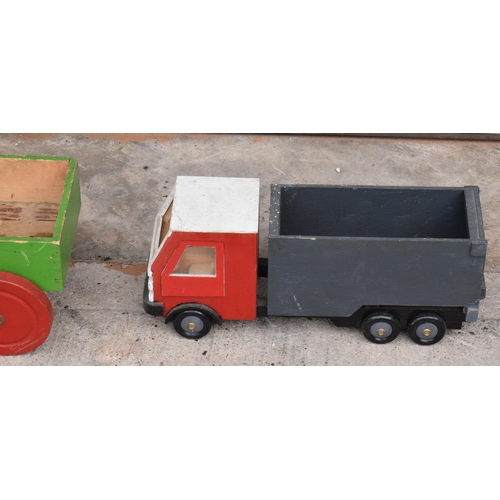 333 - A pair of vintage 20th century scratch built wooden toys in the form of a lorry and horses and cart ... 